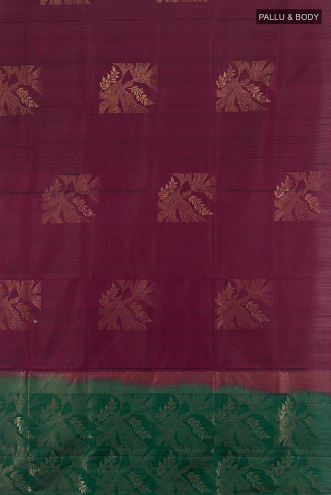 Flat view of Purple Soft Silk Saree with Zari Butta on the body and Silk Border. 