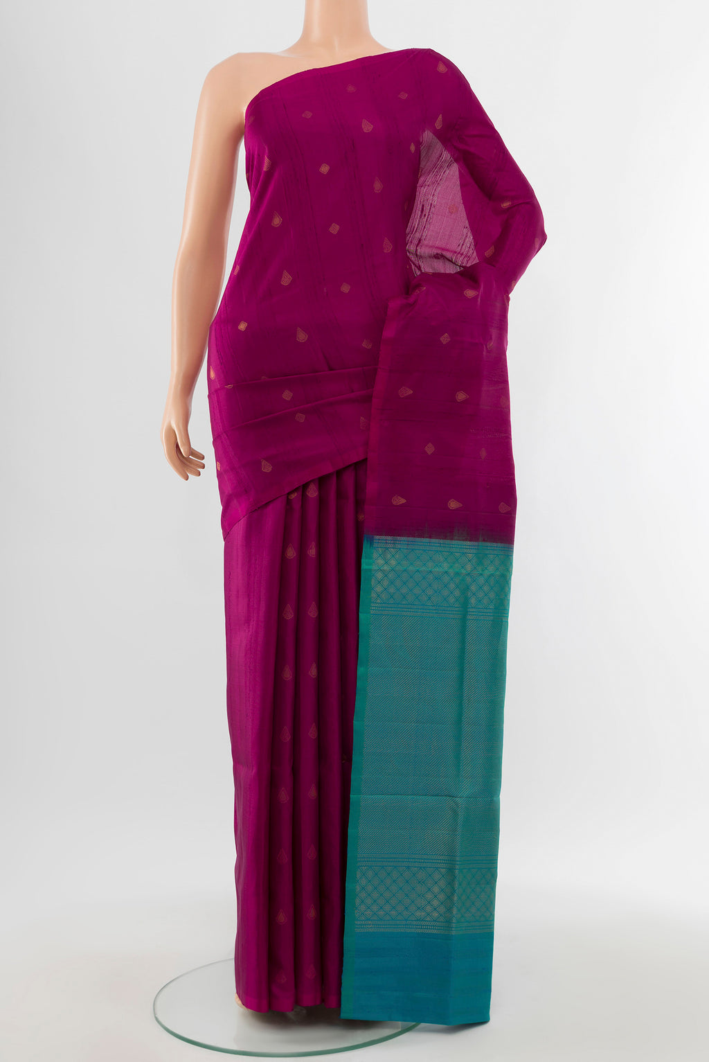 Purple Soft Silk Saree with Zari Butta on the body and Silk Border.  displayed on a mannequin
