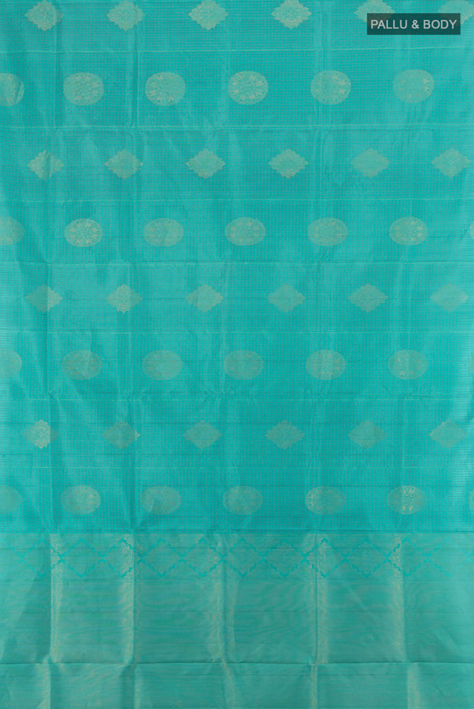 Flat view of Sky Blue Soft Silk Saree with Zari Butta on the body and Silk Border. 