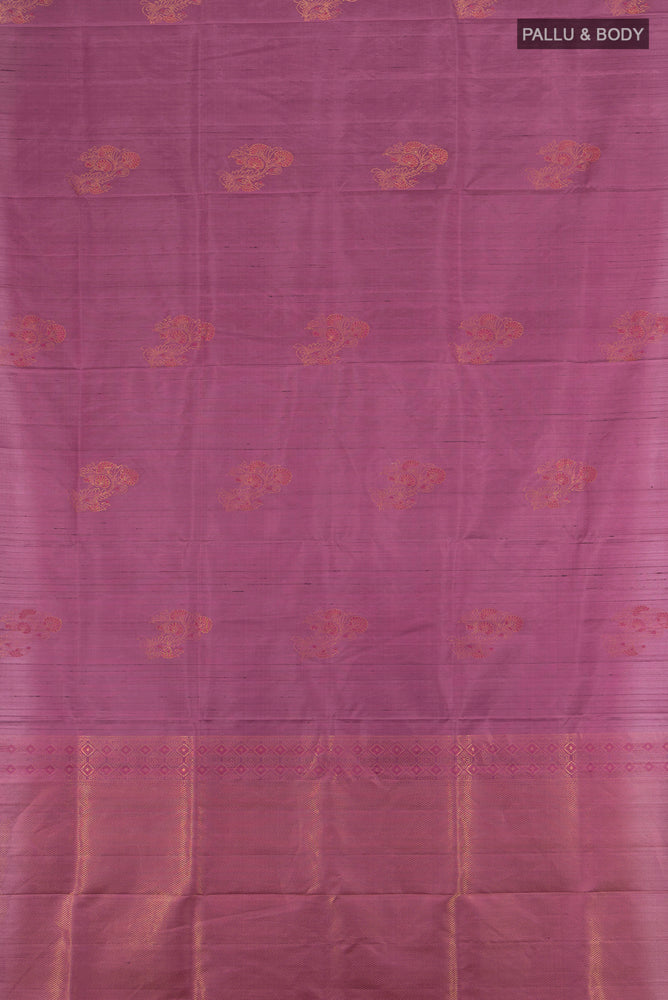 Flat view of Bronze Soft Silk Saree with Zari Butta on the body and Silk Border. 