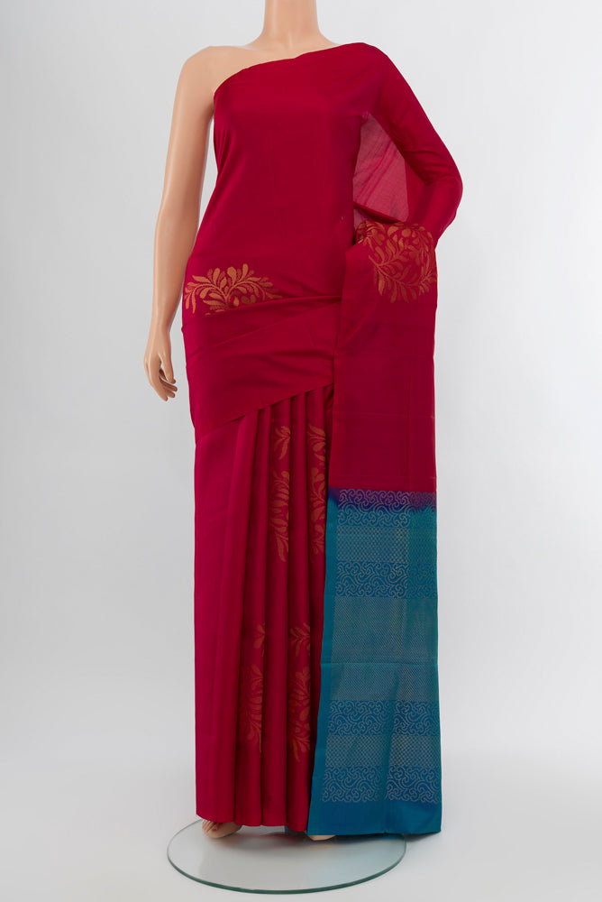 Dark Pink Soft Silk Saree with Zari Butta on the body and Silk Border.  displayed on a mannequin