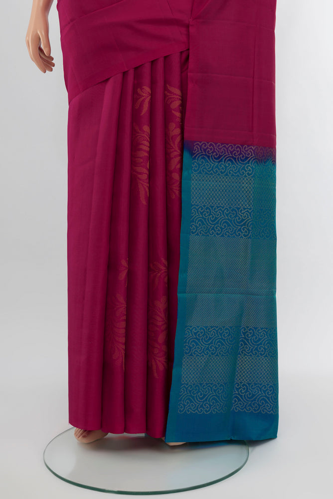 Pleats and pallu of Dark Pink Soft Silk Saree with Zari Butta on the body and Silk Border. 