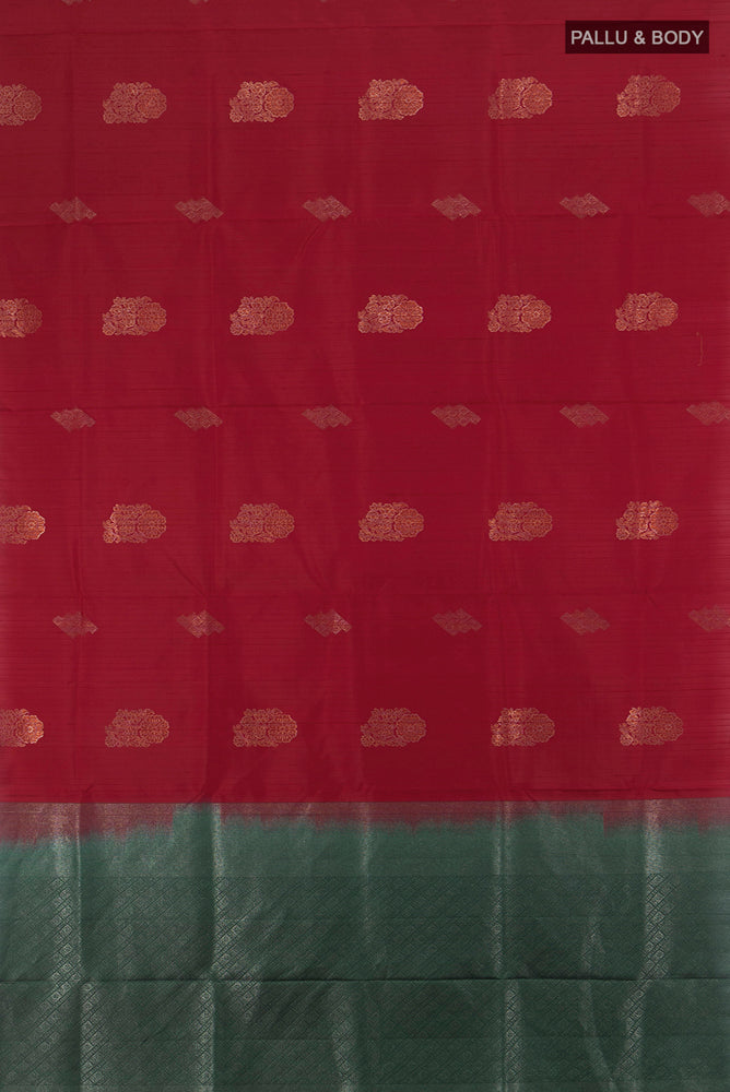 Flat view of Maroon Soft Silk Saree with Zari Butta on the body and Silk Border. 