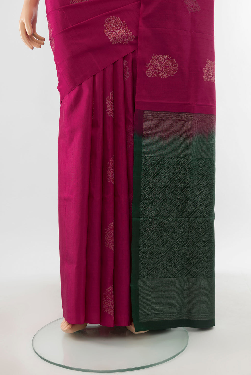 Pleats and pallu of Pure Silk Pure Zari Maroon Soft Saree with Zari Butta on the body and Silk Border. 