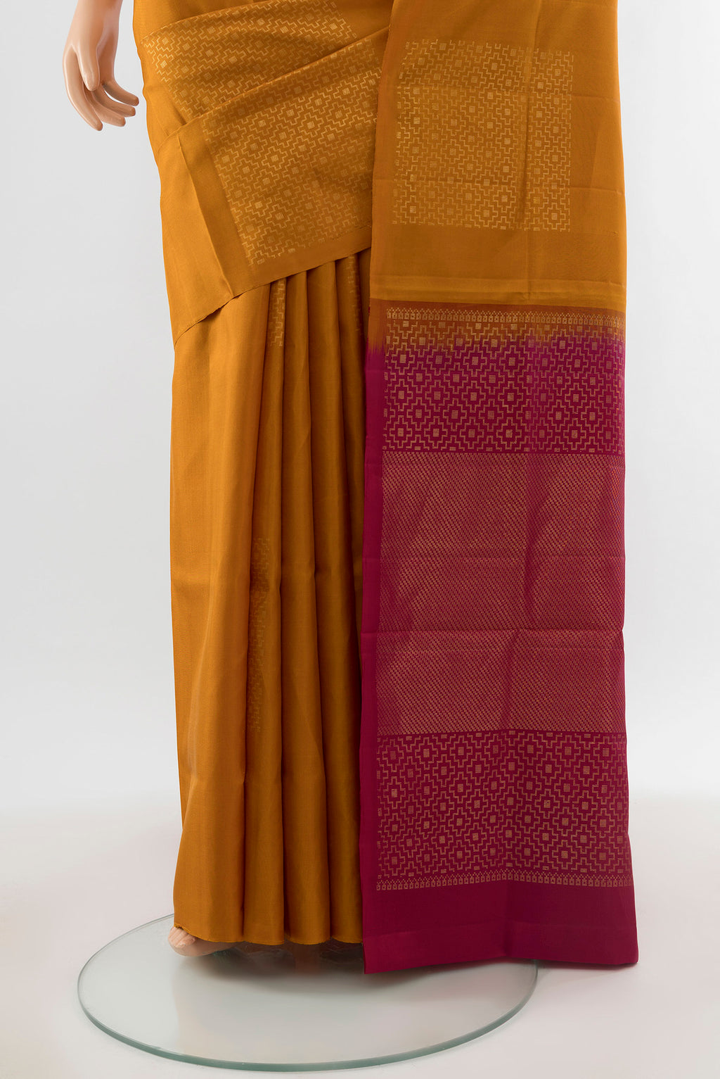 Pleats and pallu of Pure Silk Pure Zari Brown Soft Saree with Zari Butta on the body and Silk Border. 