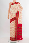 Cream Pochampally Silk Saree with Ikat design on the body and Ikat Border.  displayed on a mannequin