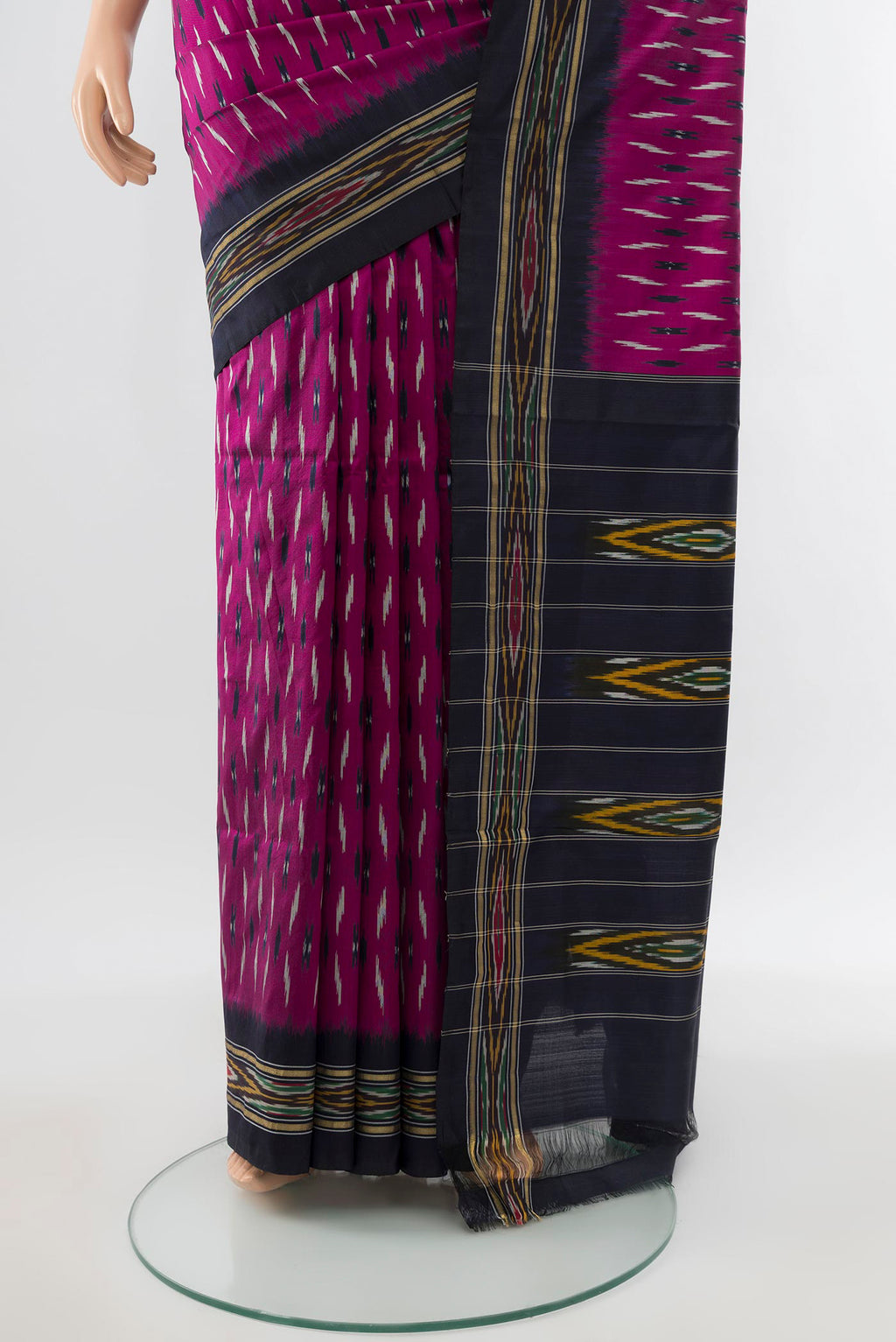 Pleats and pallu of Purple Pochampally Saree with Ikat Print on the body and Silk Border. 
