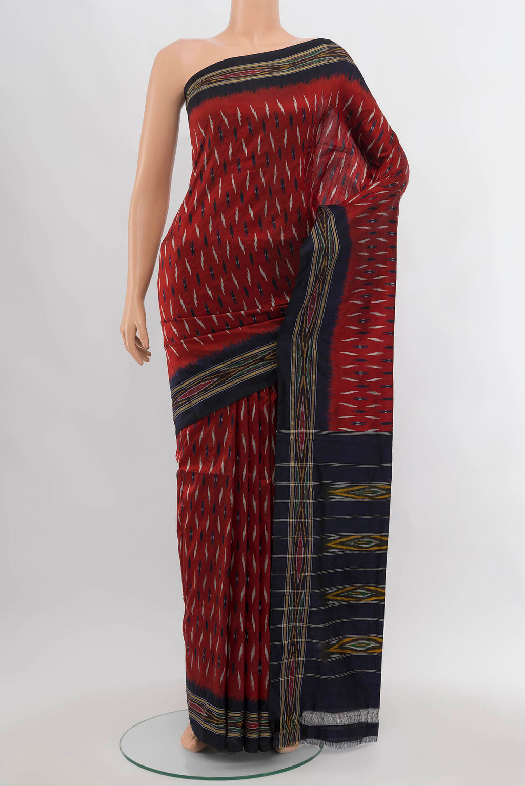 Maroon Pochampally Saree with Ikat Print on the body and Silk Border.  displayed on a mannequin