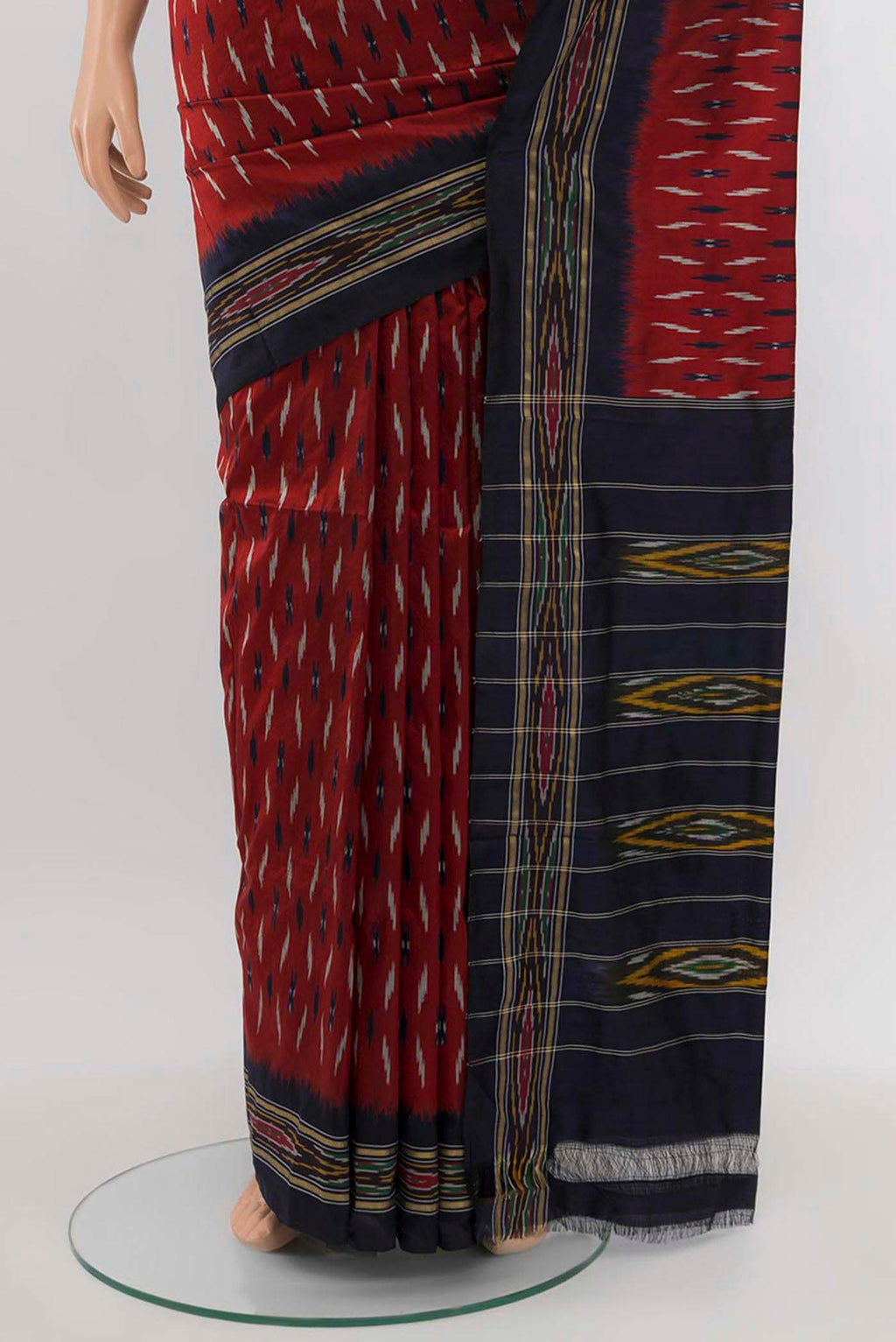 Pleats and pallu of Maroon Pochampally Saree with Ikat Print on the body and Silk Border. 