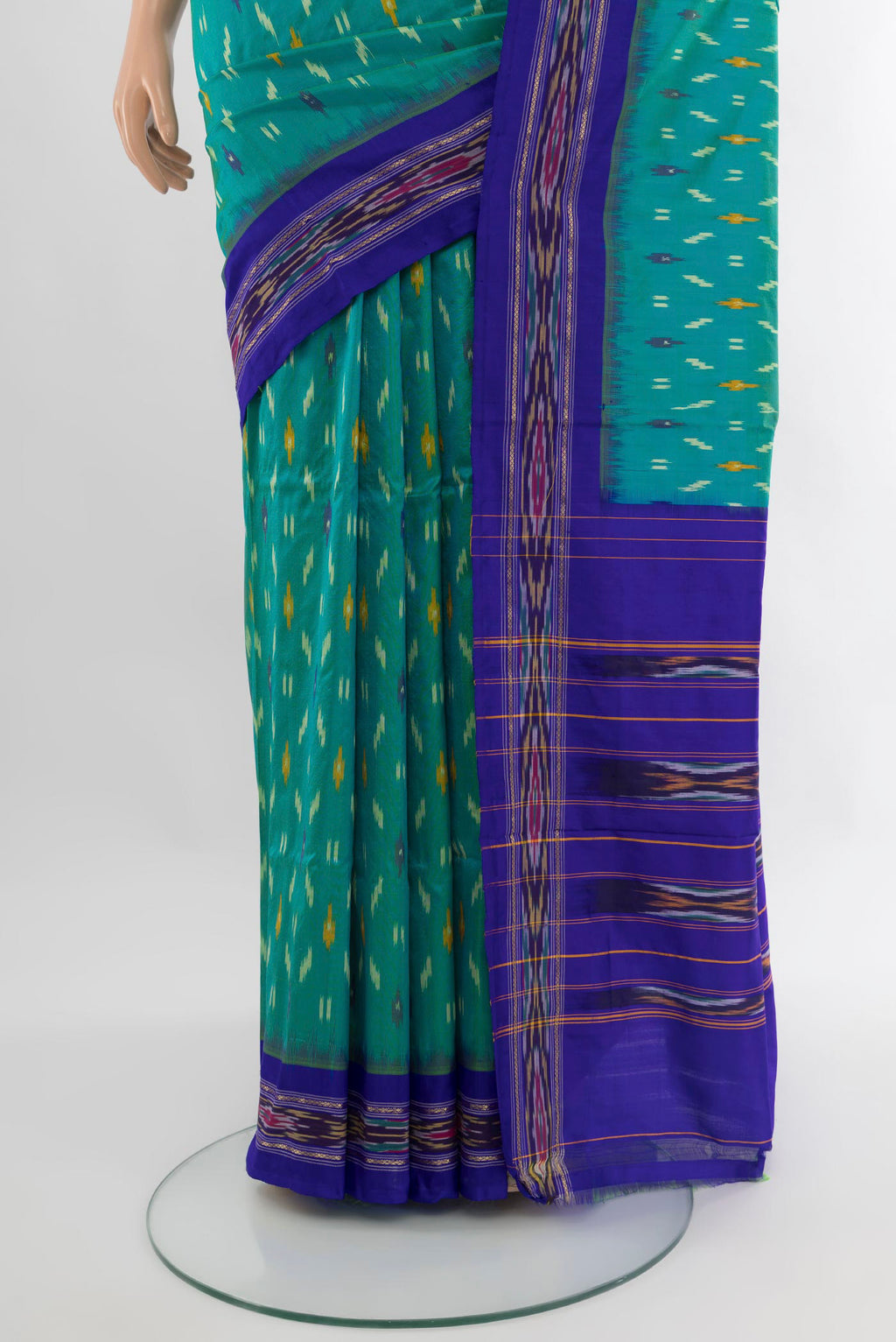 Pleats and pallu of Sea Green Pochampally Silk Saree with Ikat design on the body and Ikat Border. 