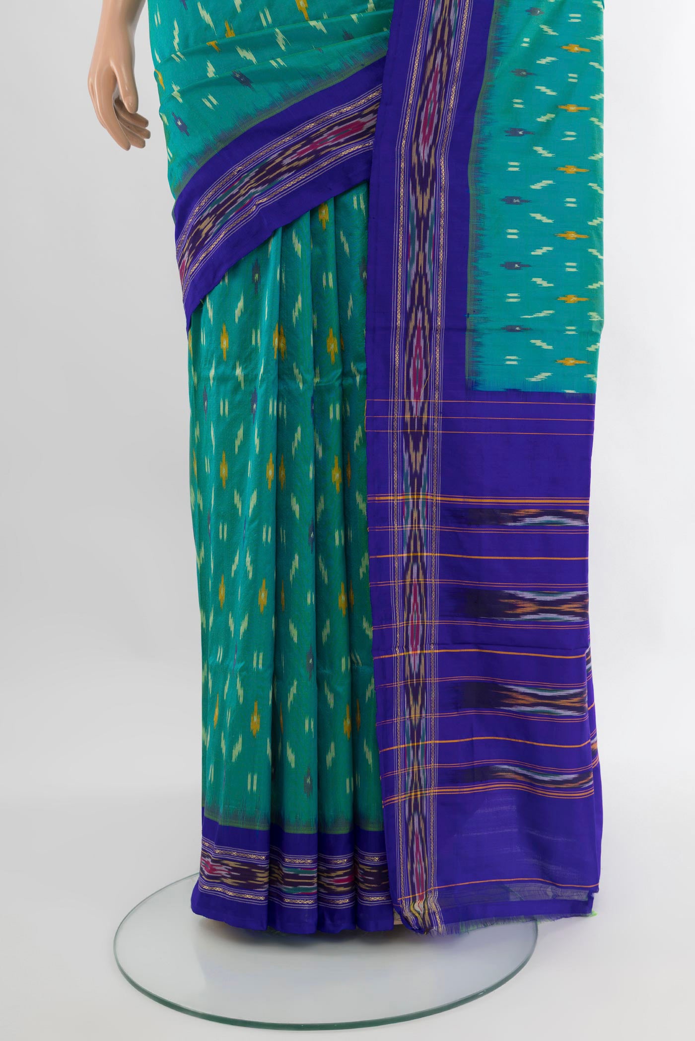 Pleats and pallu of Sea Green Pochampally Silk Saree with Ikat design on the body and Ikat Border. 