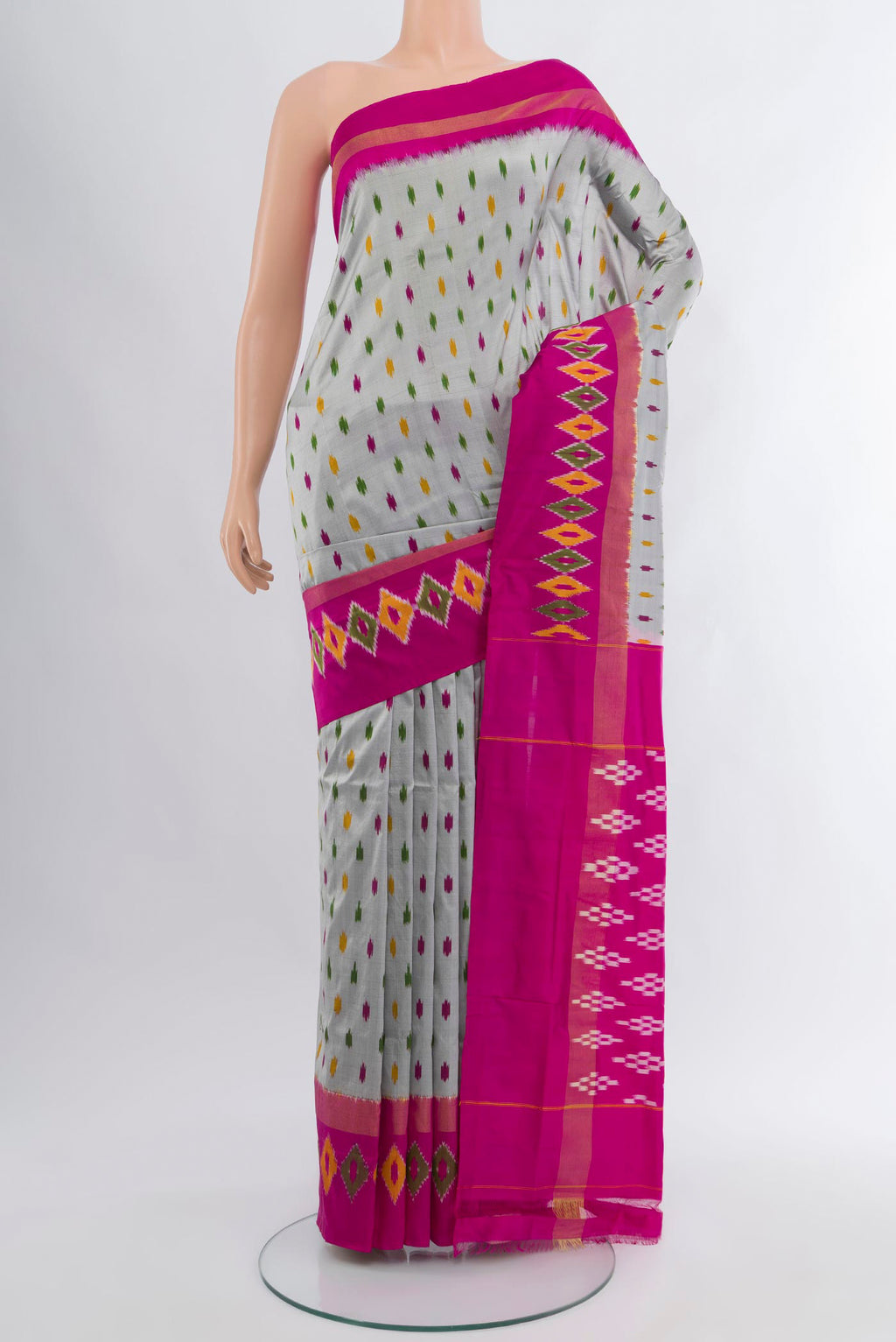 Grey Pochampally Silk Saree with Ikat Print on the body and Ikat Border.  displayed on a mannequin