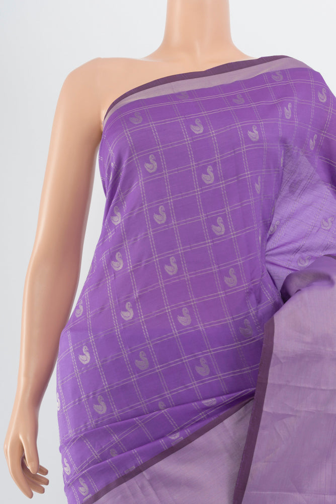 Border image of Pure Silk Pure Zari Lavender Silk Cotton Saree with Zari Butta on the body and Silk Border. 