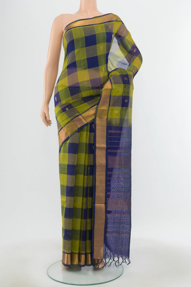 Multi Color Kora Cotton Saree with Zari Butta on the body and Silk Border.  displayed on a mannequin