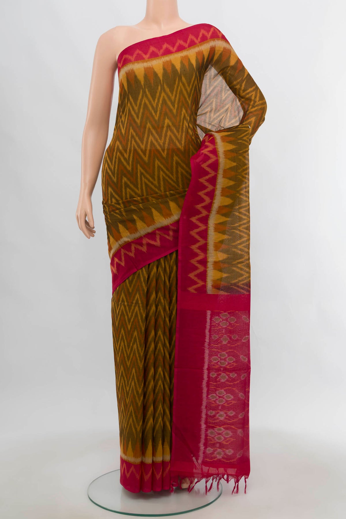 Multi Color Pochampally Cotton Saree with Ikat Print on the body and Ikat Border.  displayed on a mannequin