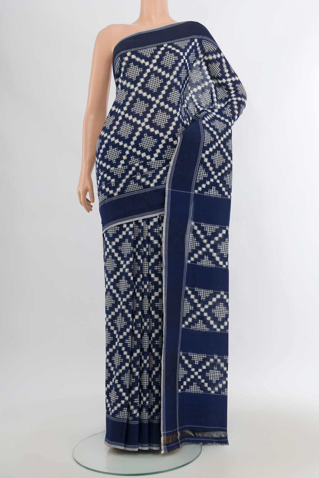 Blue Pochampally Cotton Saree with Ikat design on the body and Plain Border.  displayed on a mannequin