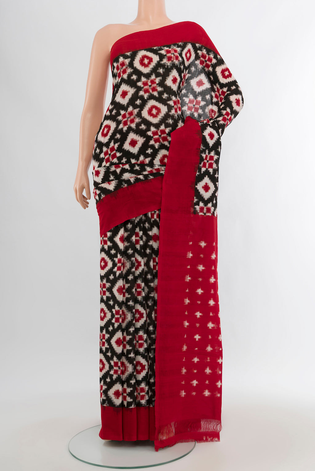 Black Pochampally Cotton Saree with Ikat design on the body and Plain Border.  displayed on a mannequin