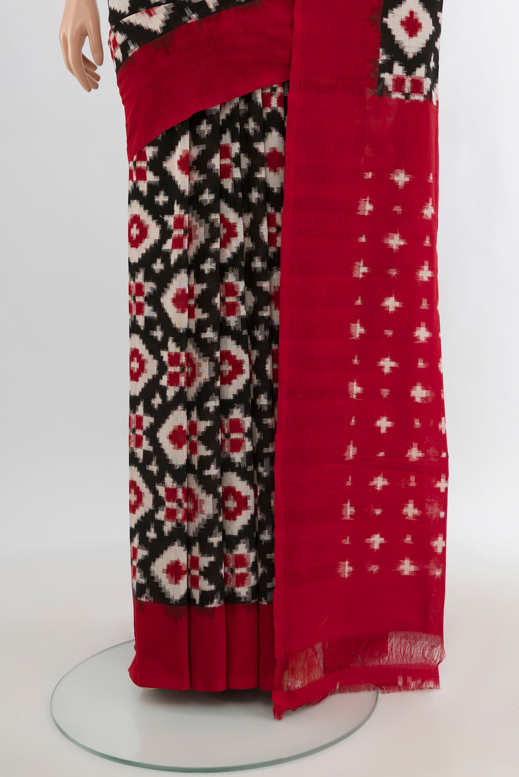 Pleats and pallu of Black Pochampally Cotton Saree with Ikat design on the body and Plain Border. 