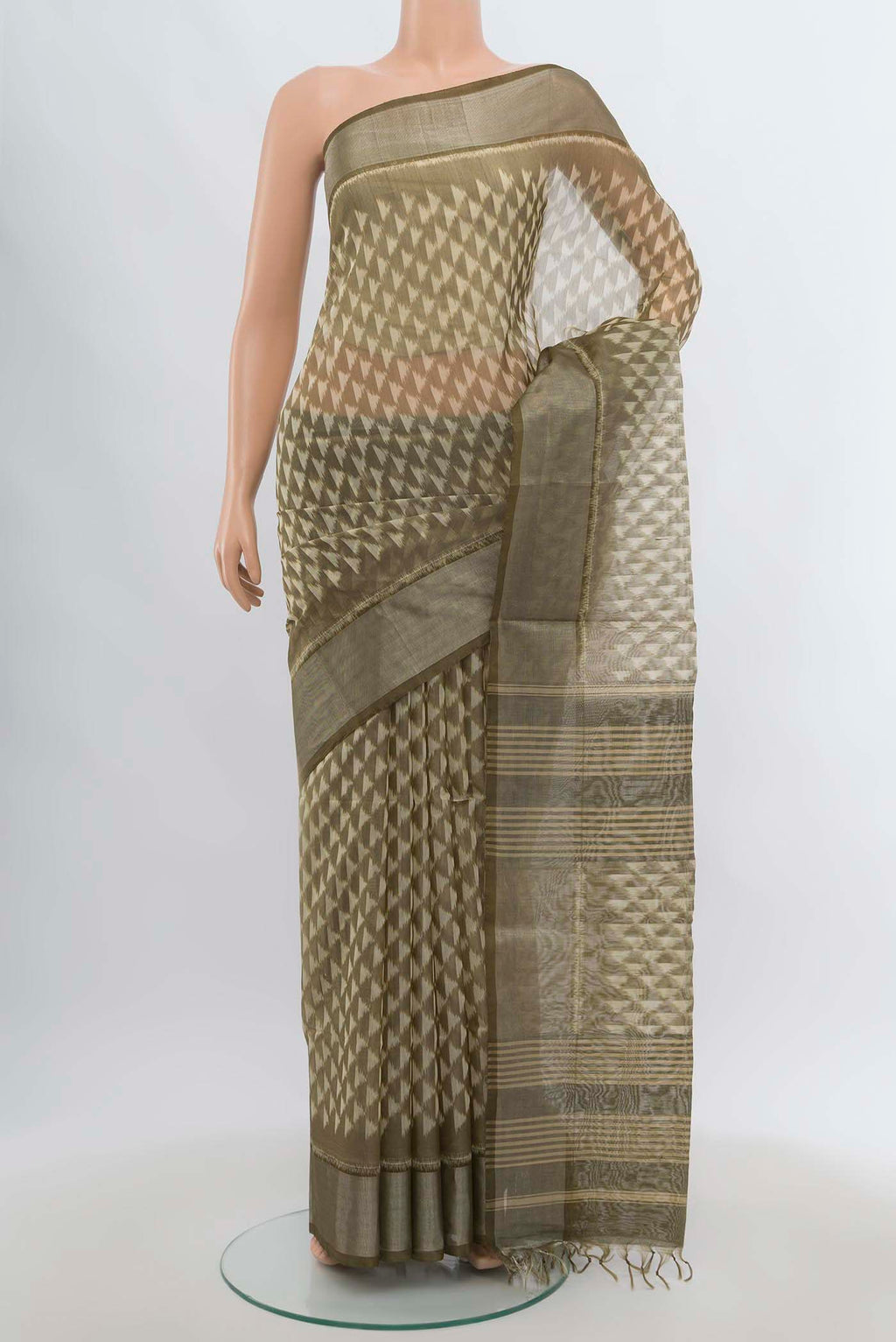 Multi Color Kora Cotton Saree with Zari Butta on the body and Zari Border.  displayed on a mannequin