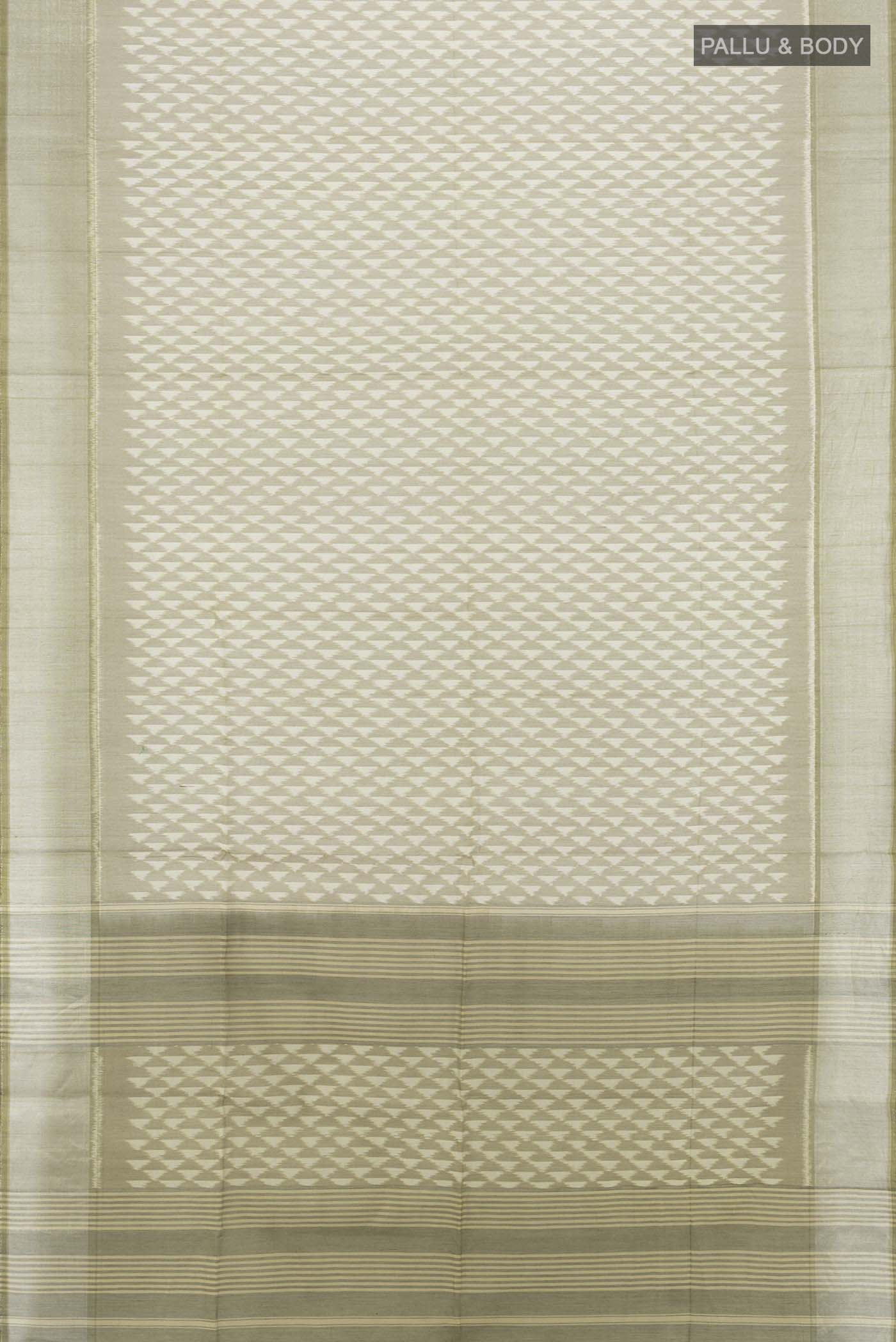 Flat view of Multi Color Kora Cotton Saree with Zari Butta on the body and Zari Border. 