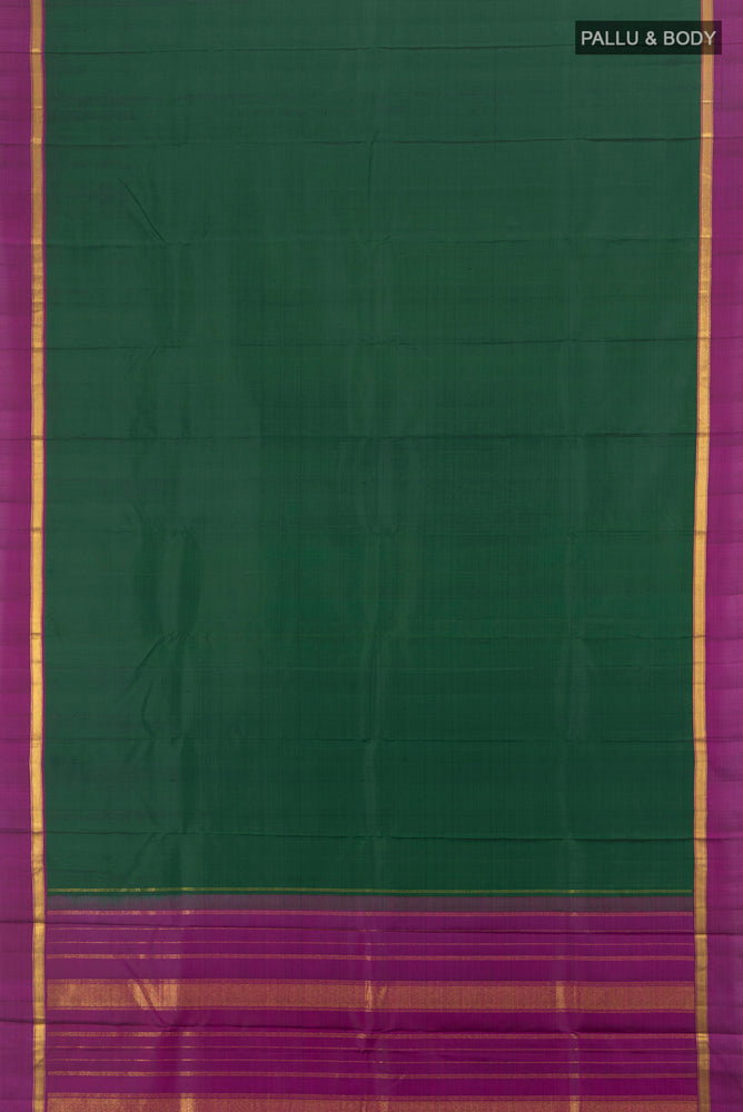 Flat view of Mint Green Kanjivaram Silk Saree with Plain Body and Silk Border. 