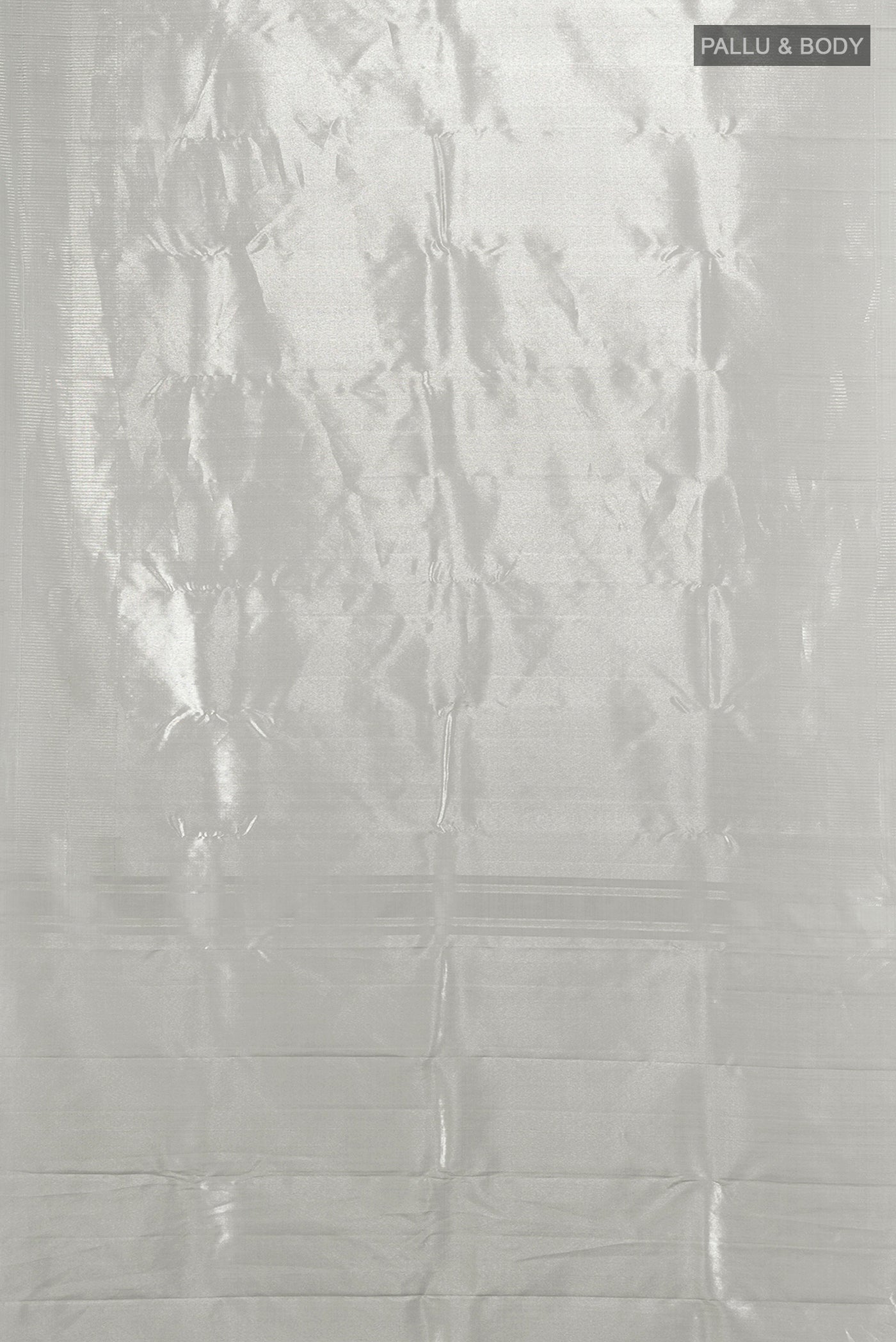 Flat view of Silver Kanchipuram Silk Saree with Zari Brocade on the body and Zari Border. 