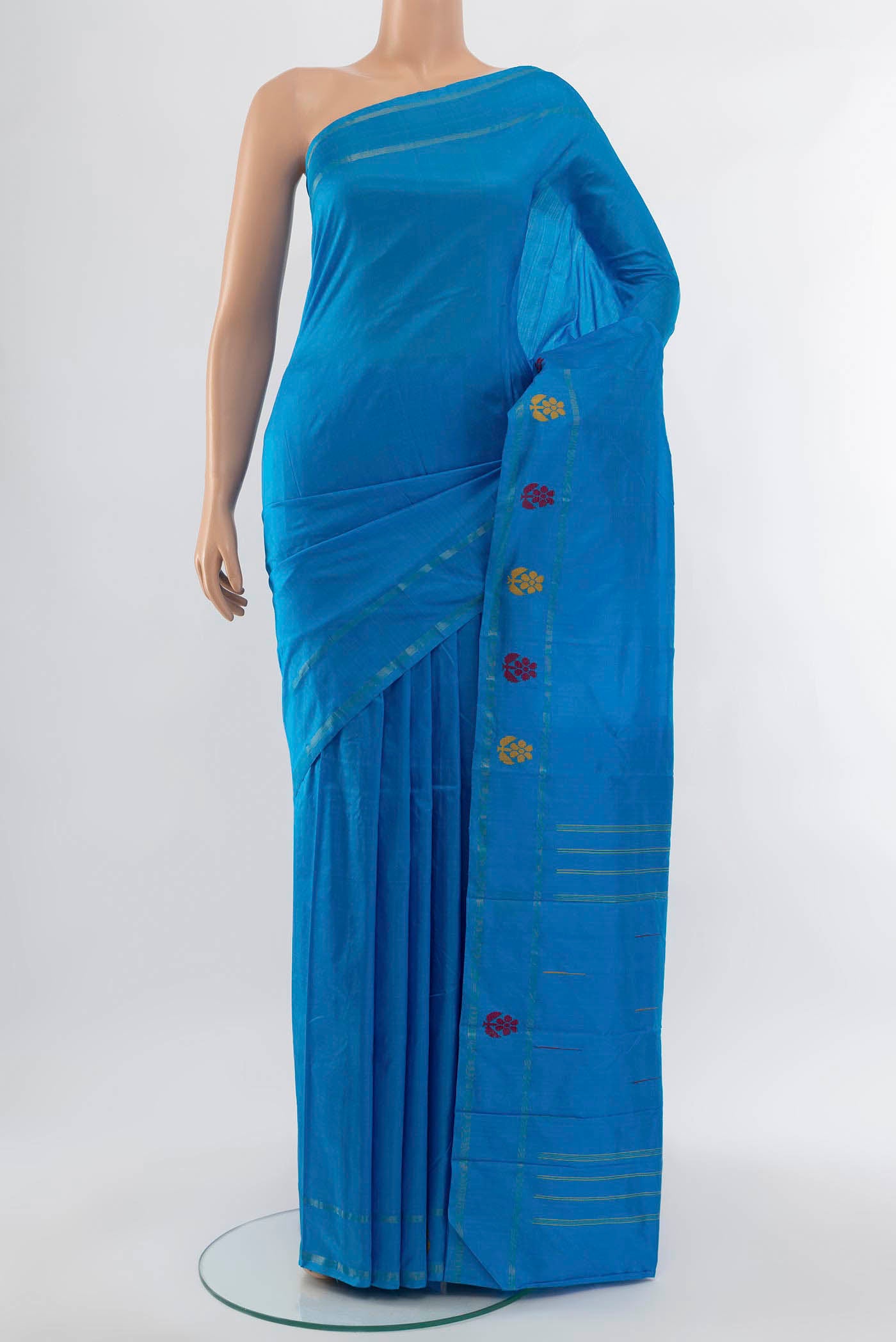 Light Blue Kanchipuram Silk Saree with Zari Butta on the body and Silk Border displayed on a mannequin