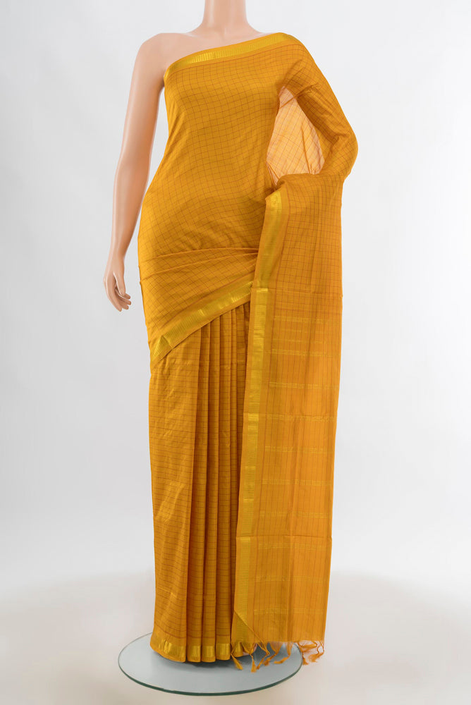 Mustard Kanchipuram Silk Nine Yards Saree with Checked design on the body and Silk Border.  displayed on a mannequin