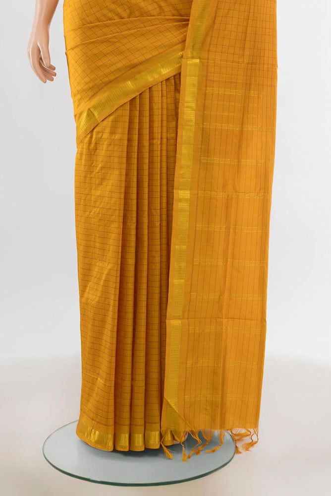 Pleats and pallu of Mustard Kanchipuram Silk Nine Yards Saree with Checked design on the body and Silk Border. 