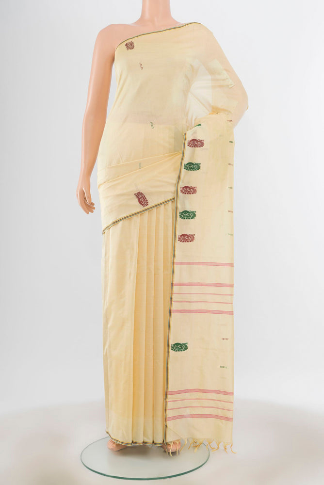 Cream Kanchipuram Silk Saree with Plain Body and Silk Border.  displayed on a mannequin