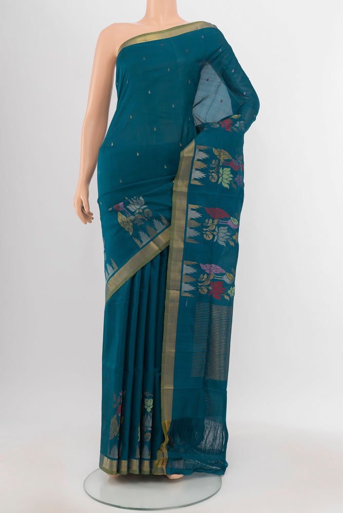 Peacock Blue Uppada Silk Saree with Zari Butta on the body and Silk Border.  displayed on a mannequin