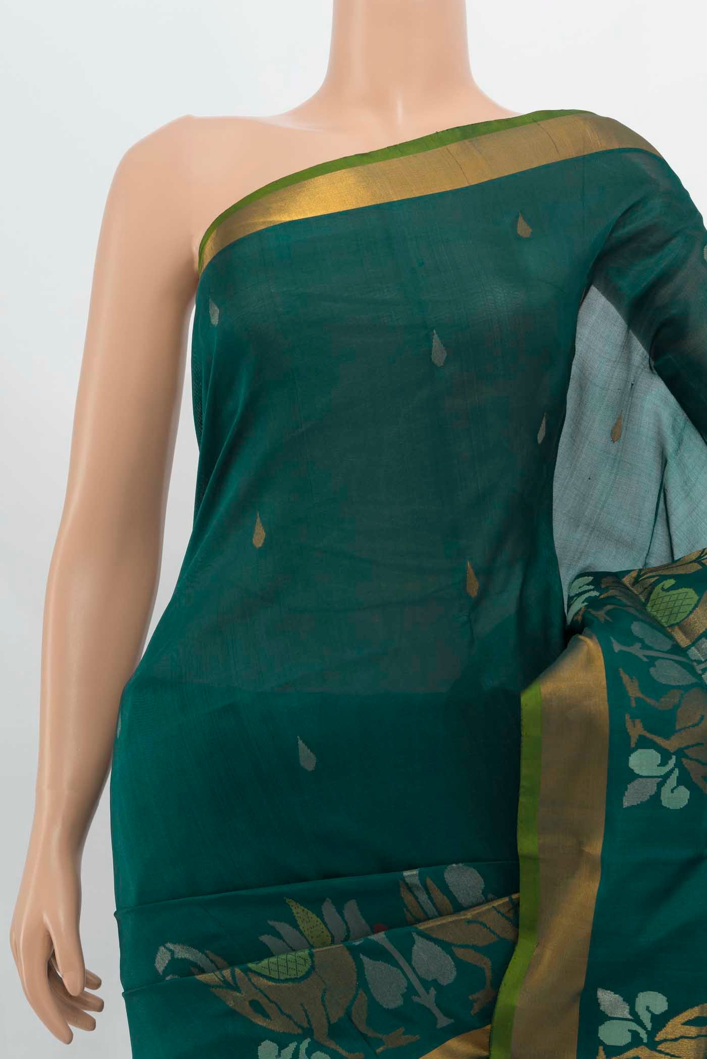 Border image of Peacock Blue Uppada Silk Saree with Zari Butta on the body and Silk Border. 