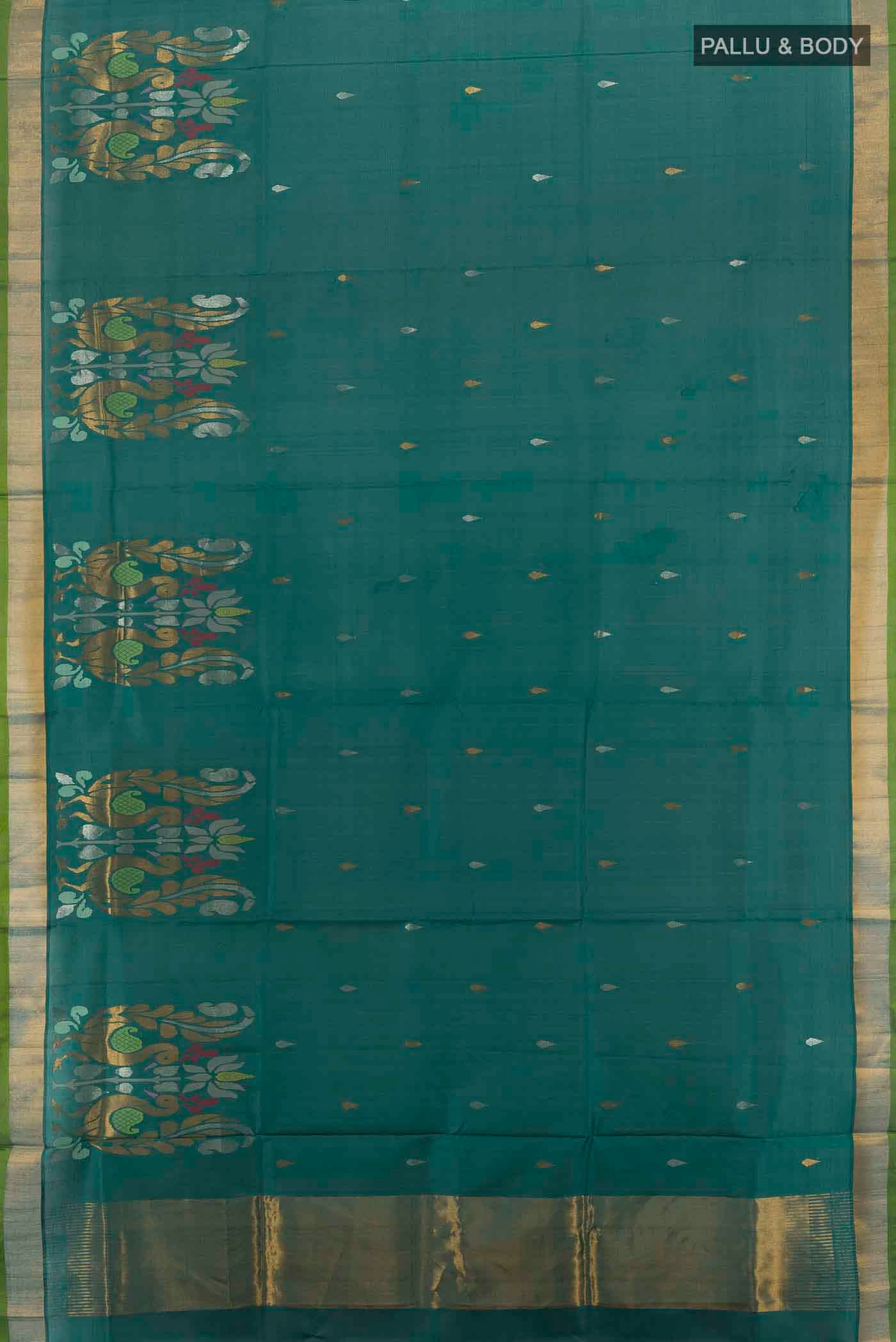 Flat view of Peacock Blue Uppada Silk Saree with Zari Butta on the body and Silk Border. 