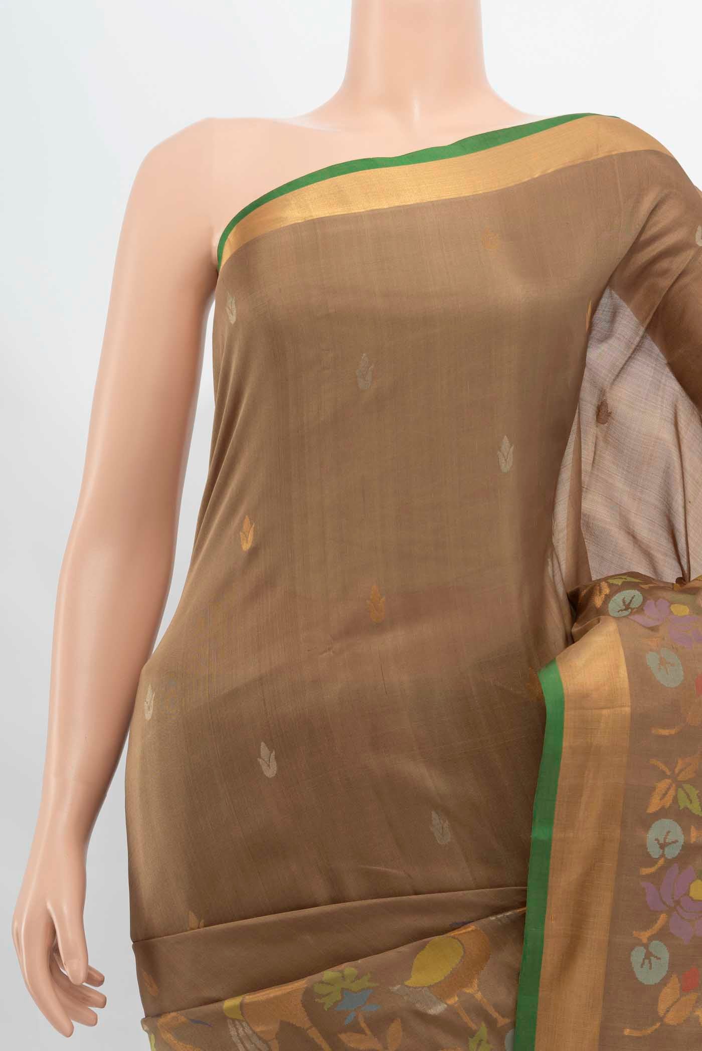 Border image of Brown Uppada Silk Saree with Zari Butta on the body and Silk Border. 