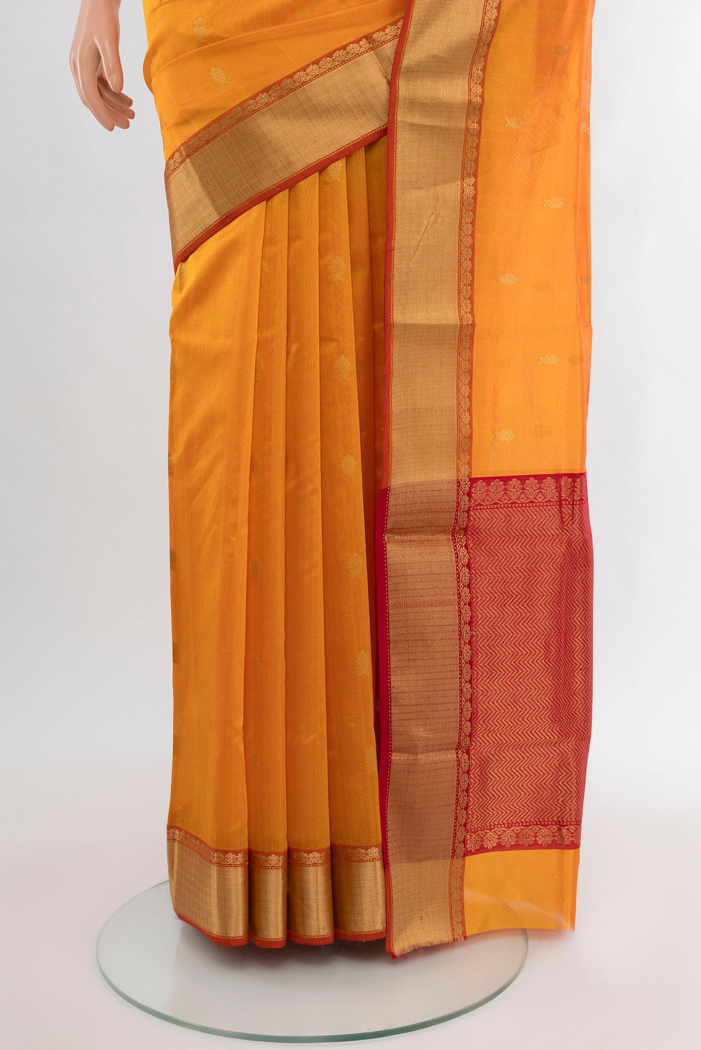 Pleats and pallu of Yellow Chanderi Silk Cotton Saree with Zari Butta on the body and Zari Border. 