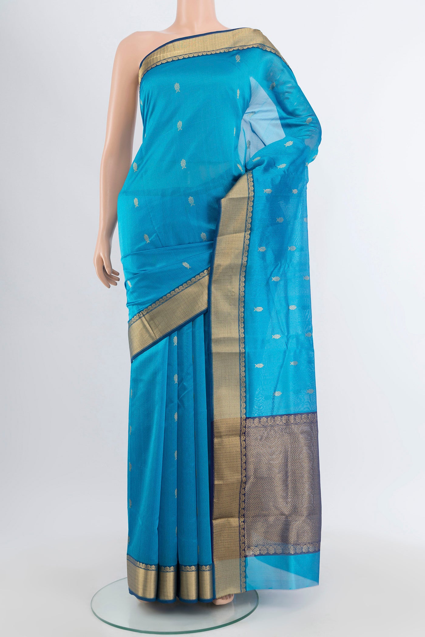 Blue Chanderi Silk Cotton Saree with Zari Butta on the body and Zari Border.  displayed on a mannequin