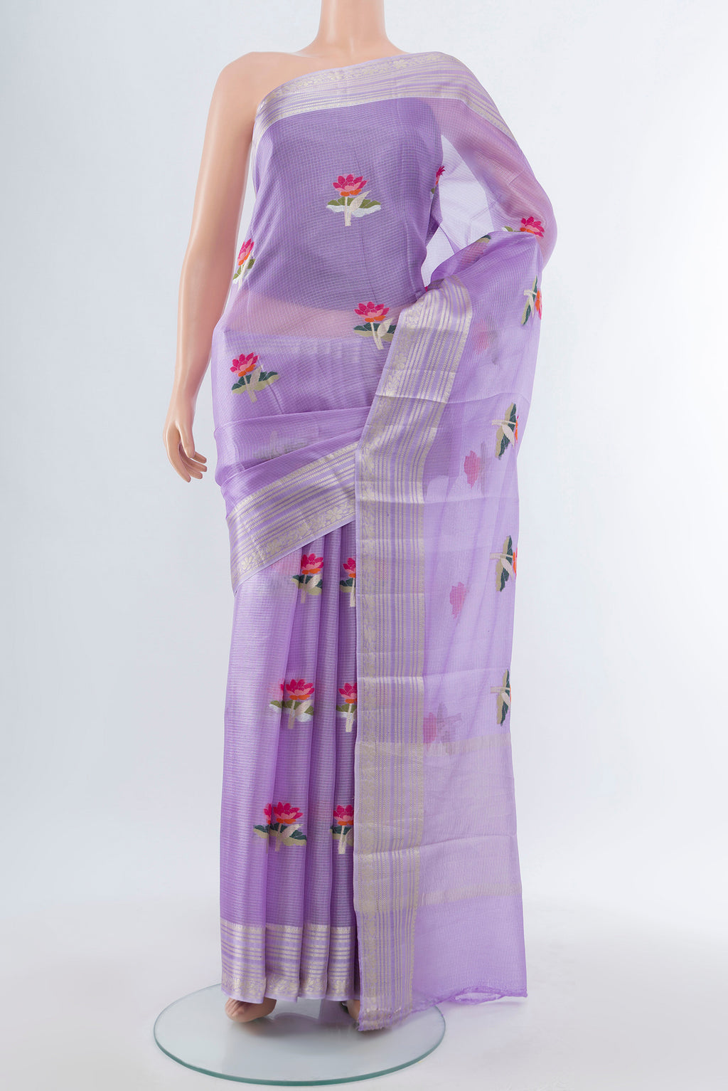 Lavender Art Silk Saree with Floral Print on the body and Silk Border.  displayed on a mannequin