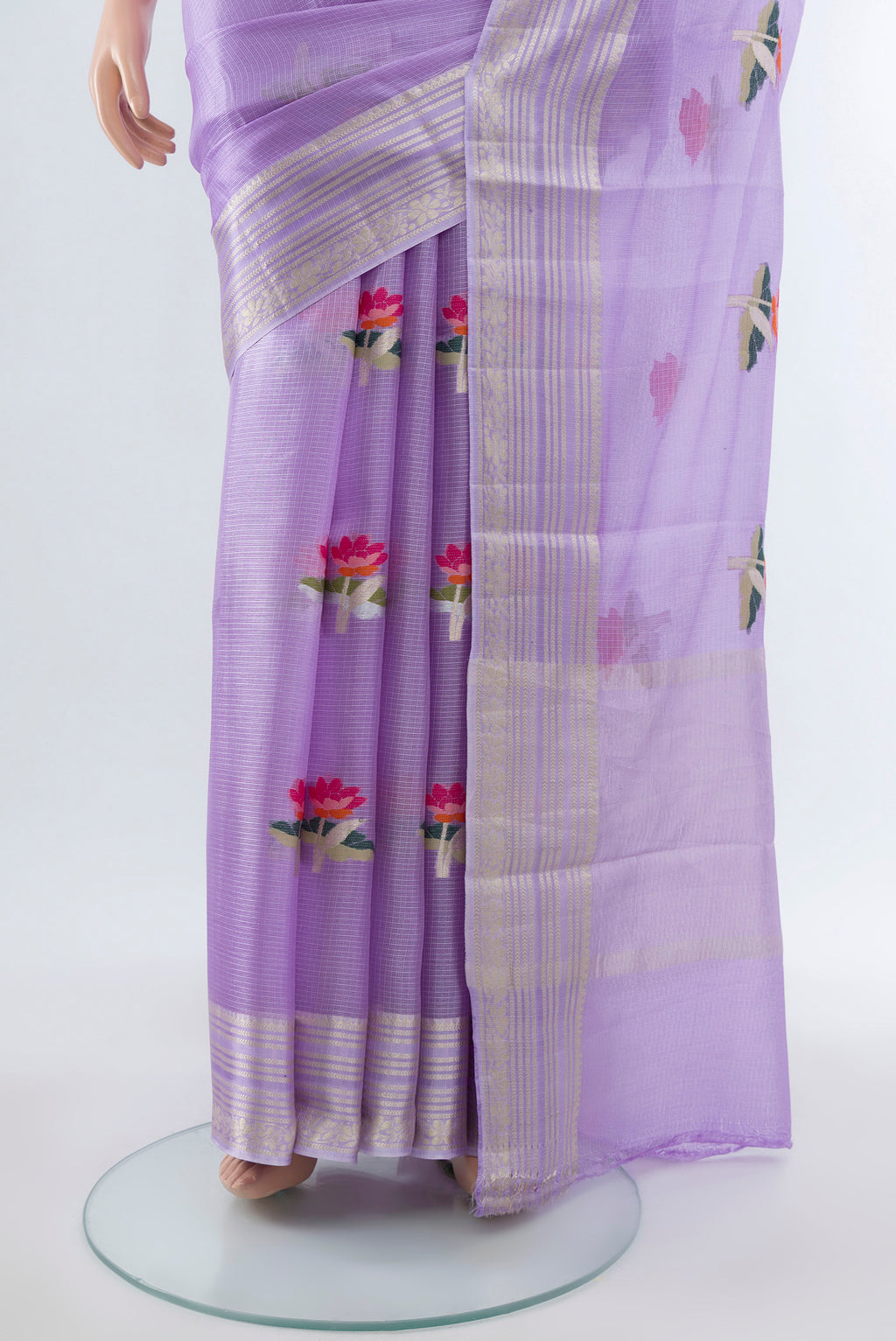 Pleats and pallu of Lavender Art Silk Saree with Floral Print on the body and Silk Border. 