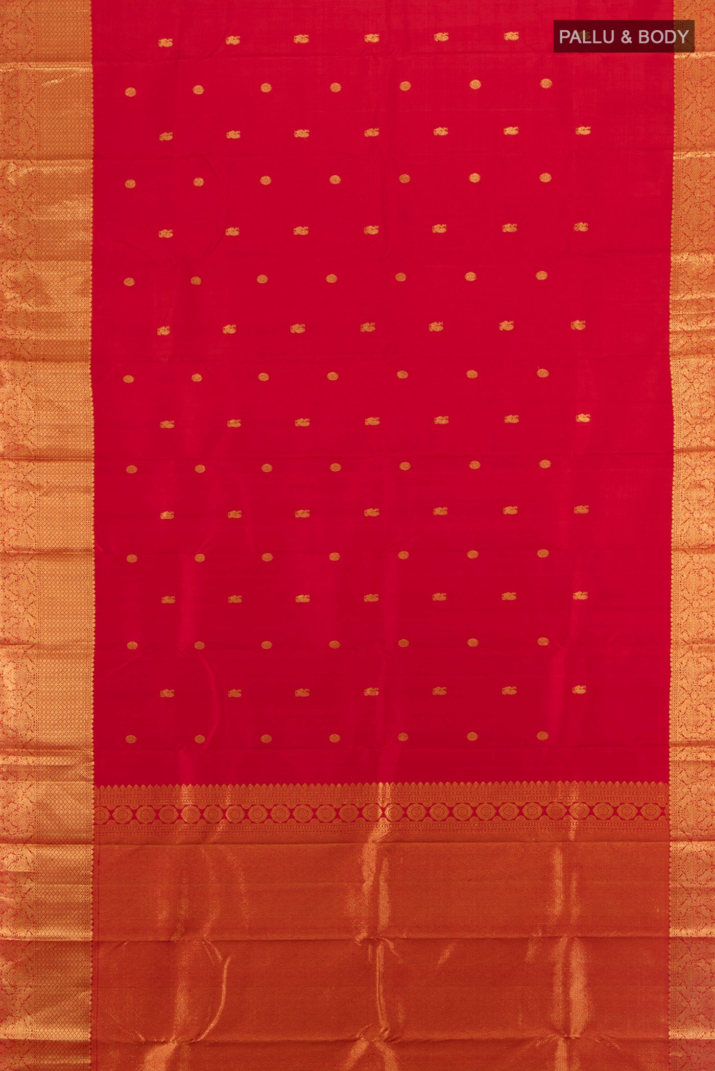Flat view of Red Kanchipuram Silk Saree with Zari Butta on the body and Silk Border. 