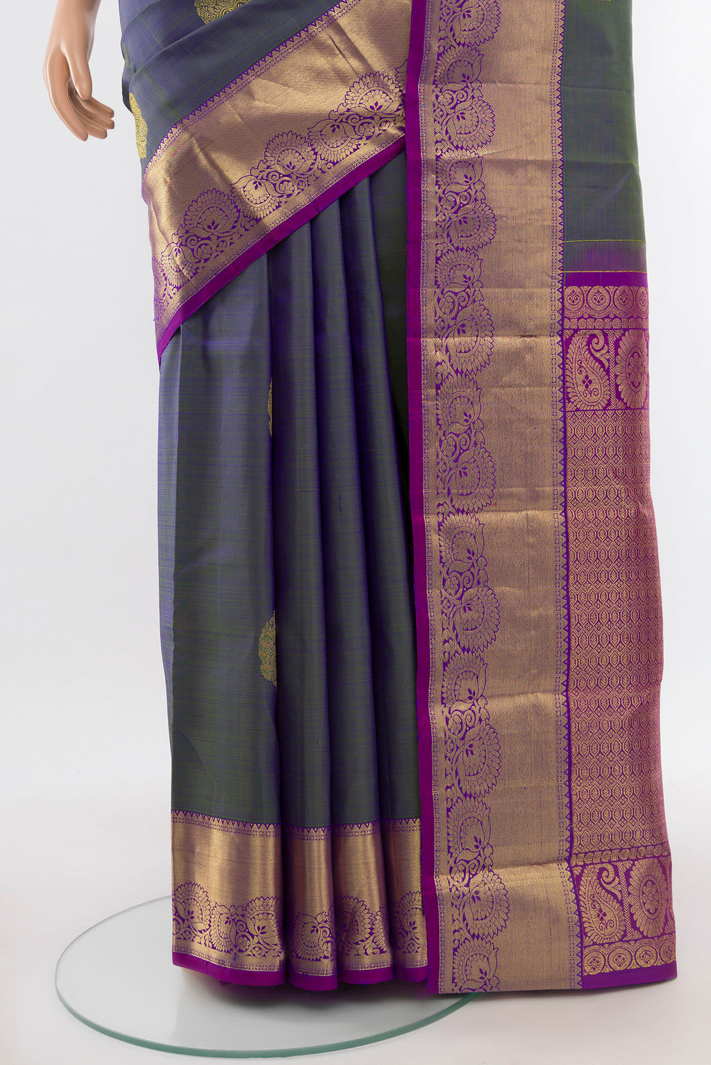 Pleats and pallu of Pure Silk Pure Zari Light Blue Kanchipuram Saree with Zari Butta on the body and Silk Border. 