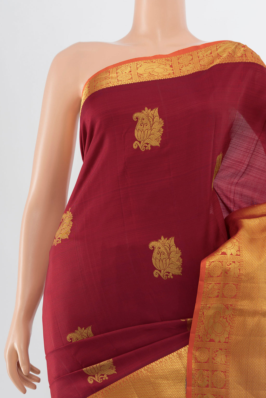 Border image of Maroon Kanchipuram Silk Saree with Zari Butta on the body and Silk Border. 