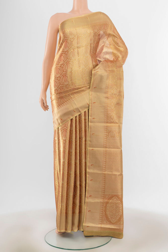 Golden Kanjivaram Silk Saree with Zari Butta on the body and Silk Border.  displayed on a mannequin