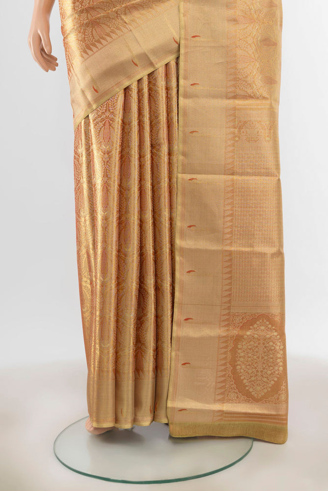 Pleats and pallu of Golden Kanjivaram Silk Saree with Zari Butta on the body and Silk Border. 