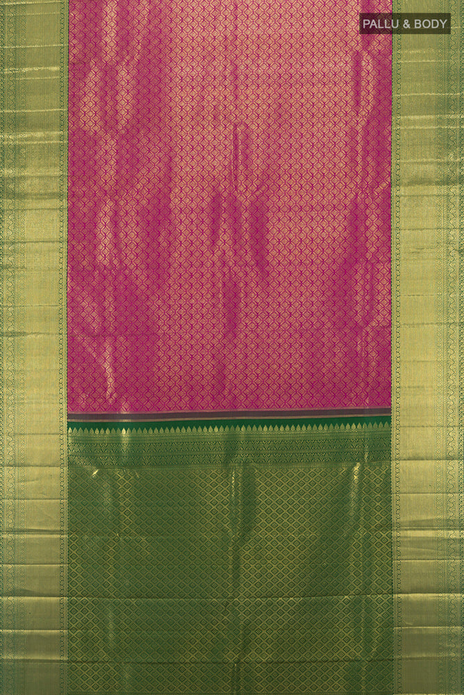 Flat view of Purple Kanchipuram Silk Saree with Zari Brocade on the body and Silk Border. 