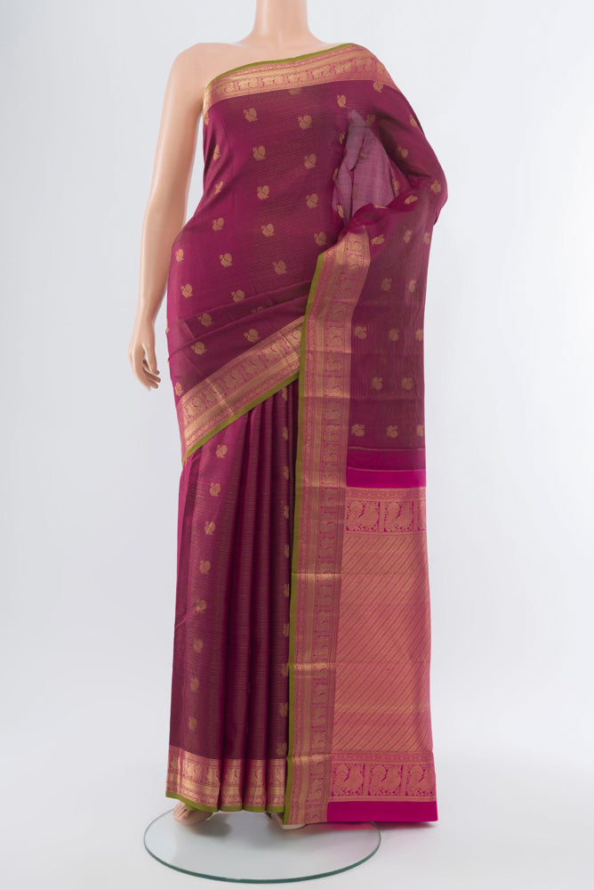 Purple Kanchipuram Silk Saree with Zari Butta on the body and Silk Border.  displayed on a mannequin