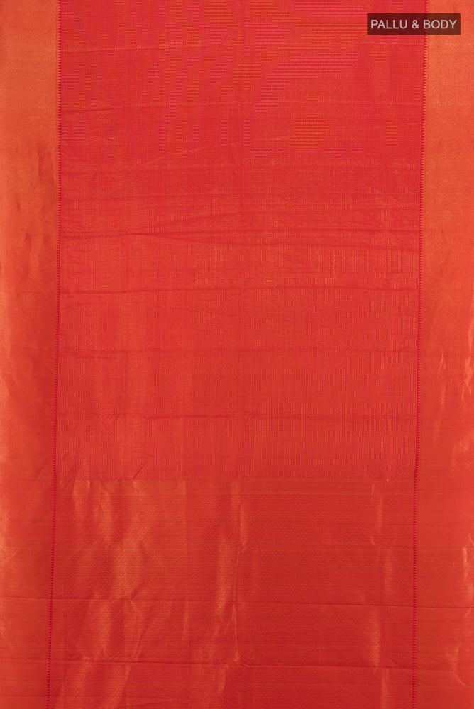 Flat view of Rust Kanchipuram Silk Saree with Zari Butta on the body and Silk Border. 