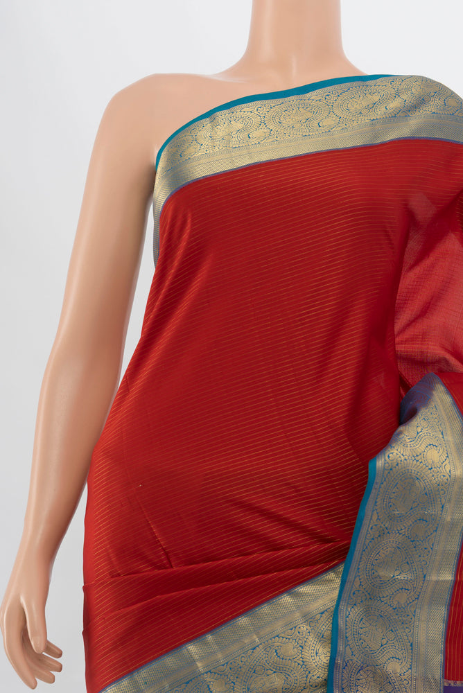 Border image of Maroon Kanchipuram Silk Saree with Zari Butta on the body and Silk Border. 