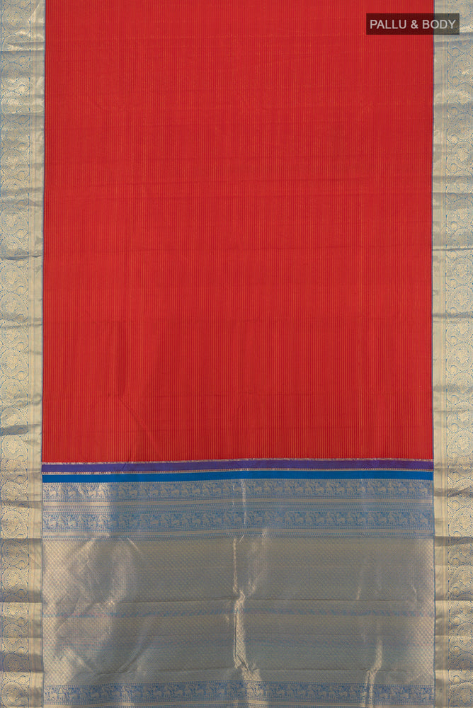 Flat view of Maroon Kanchipuram Silk Saree with Zari Butta on the body and Silk Border. 