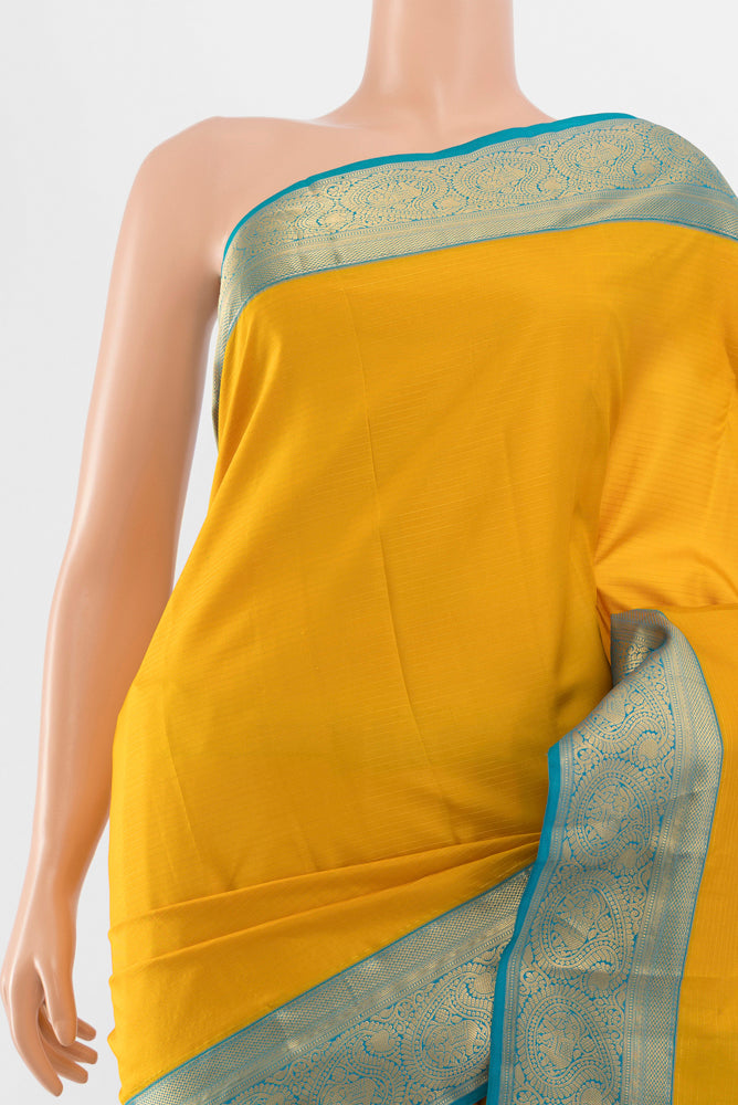 Border image of Yellow Kanchipuram Silk Saree with Zari Butta on the body and Silk Border. 