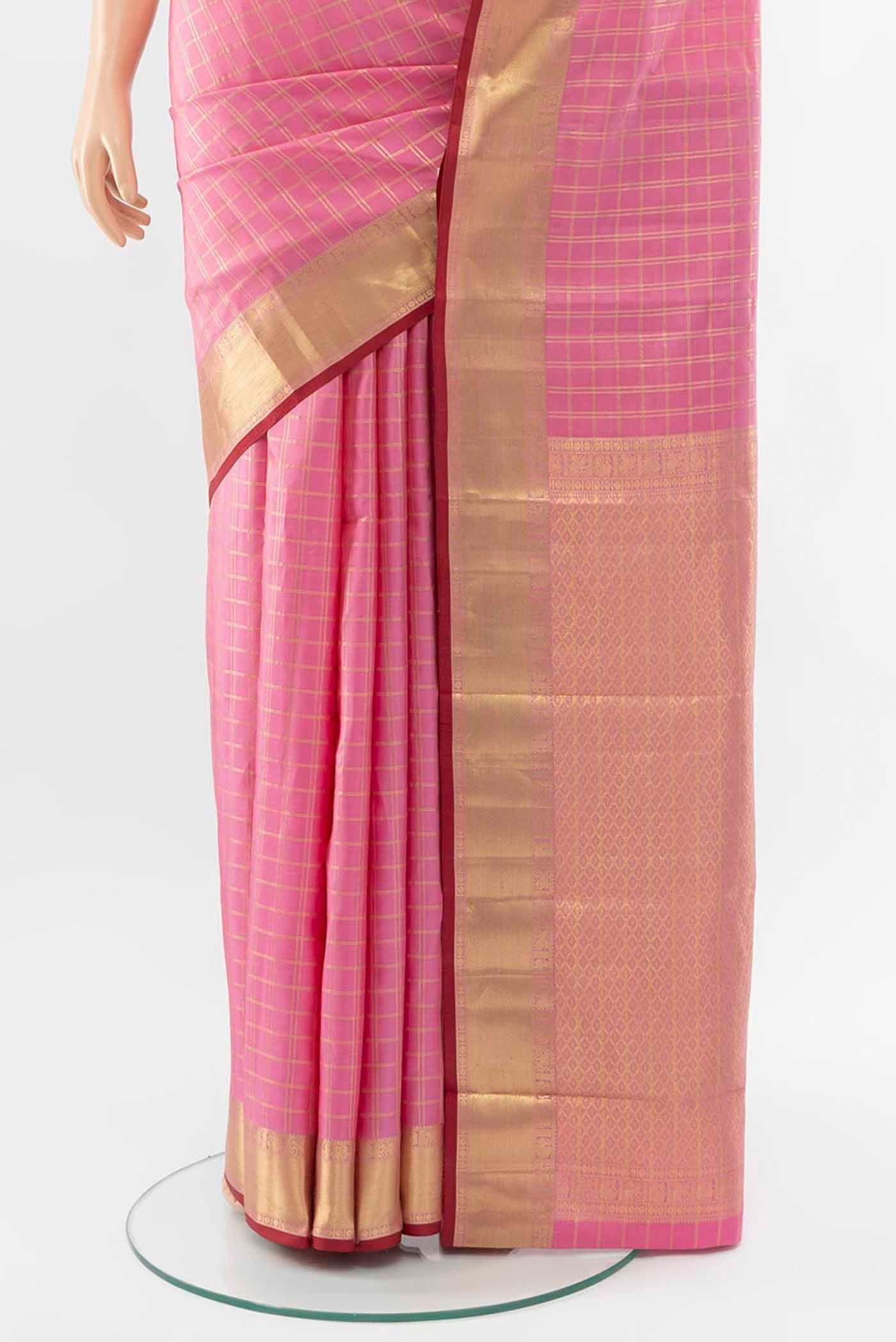 Pleats and pallu of Rose pink Kanchipuram Silk Saree with Checked design on the body and Zari Border